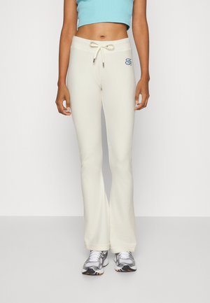 Juicy Couture TRACK PANTS WITH BUBBLE GRAPHIC - Tracksuit bottoms - sugar swizzle