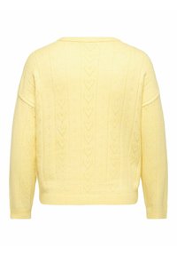 Pull en maille jaune doux avec des motifs en forme de cœur subtils et des poignets et un ourlet côtelés, vu de dos.