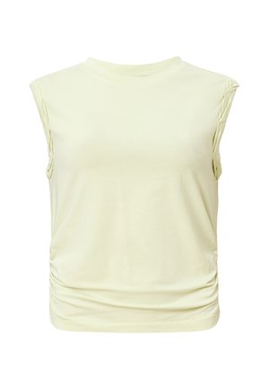 vaaleankeltainen puuvillainen hihaton toppi, jossa on pyöreä pääntie ja pussitettua sivutietoa, tarjoten istuvan siluetin.