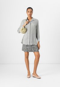Marimekko RUNSAS PIIRTO UNIKKO - Button-down blouse - grey/light grey