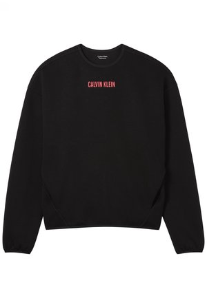 Melna garām piedurknēm džemperis ar apaļu kaklu, uz krūtīm centrēts sarkans uzraksts "CALVIN KLEIN" un riboti aproces gali.