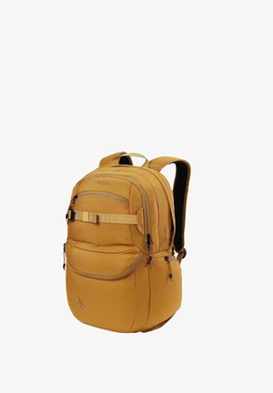 Sac à dos Nitro jaune-brun avec plusieurs compartiments zippés, bretelles rembourrées et une sangle avant pour sécuriser les objets.