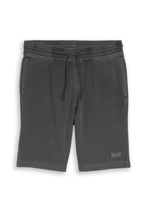 Pantalones cortos de tela de punto gris oscuro con cintura ajustable con cordón y bolsillos laterales, con un pequeño parche de logo rectangular cerca del dobladillo.