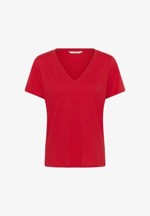 T-shirt en coton rouge avec un col en V et des manches courtes, présentant une texture lisse et une coupe décontractée. Aucun motif ni accent visible.