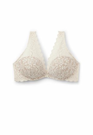 Beige kanten bralette met geschulpte randen, bloemmotieven, verstelbare banden en een zachte, gestructureerde afwerking.