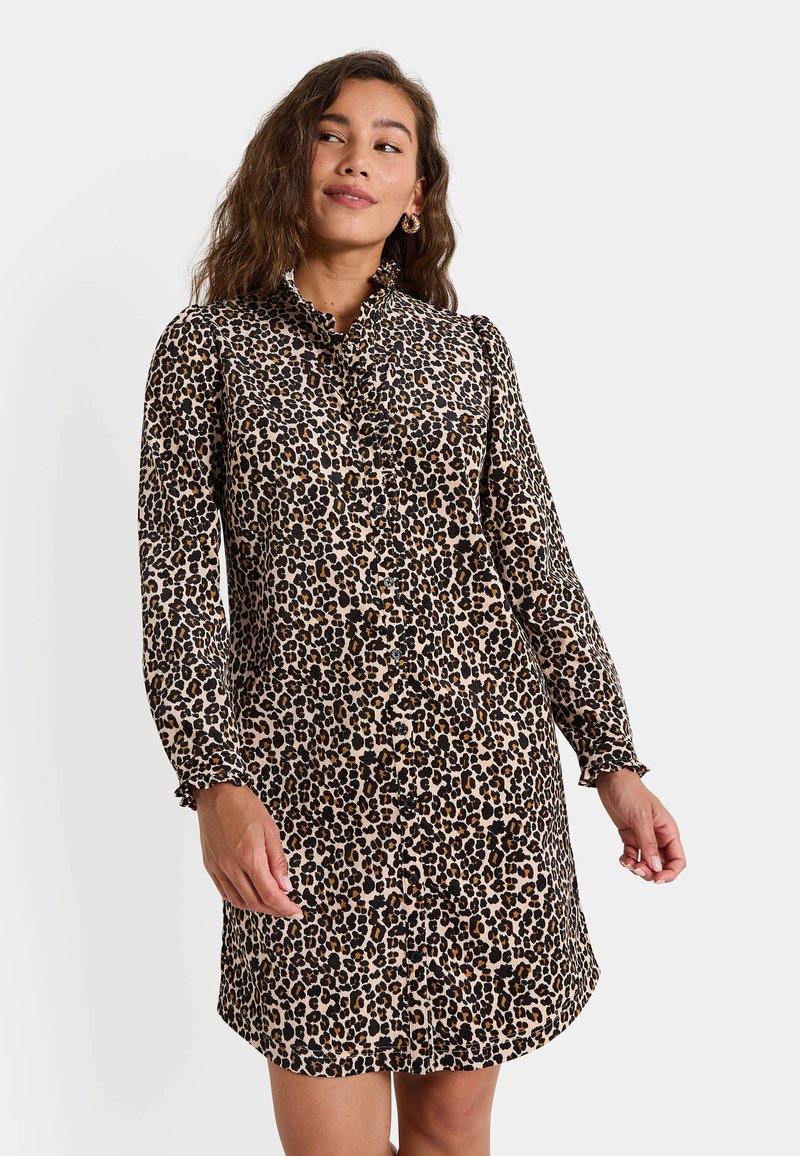 Vestido de estampado de leopardo con cuello tipo camisa, cierre delantero con botones, mangas largas con puños acampanados y un dobladillo ligeramente acampanado.