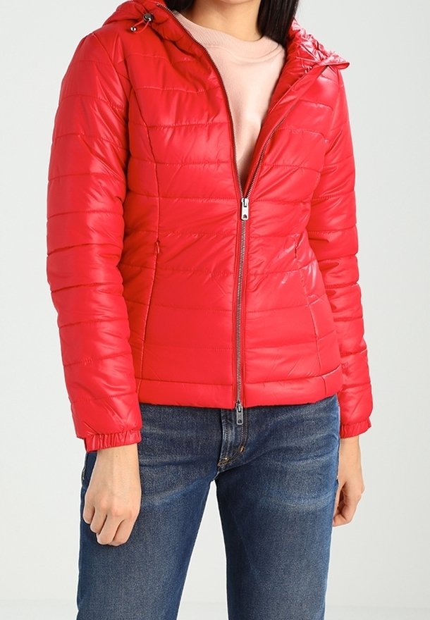 Red puffy jacket with horizontal quilted pattern, front zip closure, and adjustable hood. Made from shiny material, paired with blue jeans.