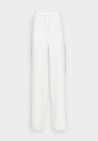 White wide-leg sweatpants with a textured finish, featuring an elastic waistband and drawstring, adorned with black side accents.