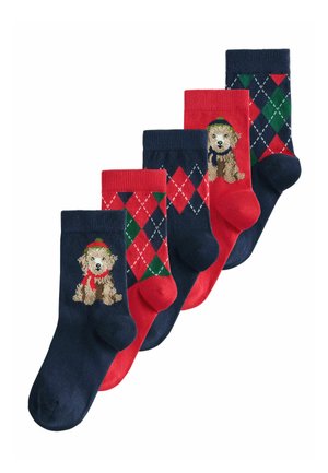 Cinco pares de calcetines en azul marino, rojo y verde. Tres presentan un diseño de perro, mientras que dos tienen un patrón de diamante con acentos en blanco.