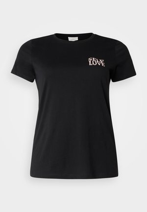Black cotton t-shirt with short sleeves, round neck. Features the text "SELF LOVE" in light pink on the upper left side.