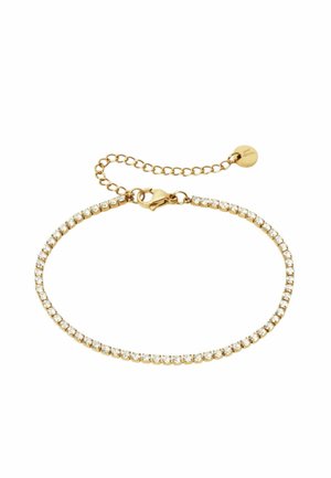 Bracelet chaîne en or avec petites pierres transparentes et fermoir mousqueton, équipé d'une chaîne d'extension réglable avec un pendentif rond.