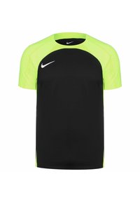 Camisa atlética de manga corta negra y amarilla neón con logotipos de swoosh blancos de Nike en el pecho y el cuello.