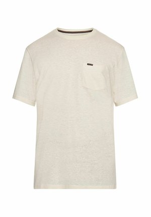 Vaaleanbeige lyhytnenäinen t-paita, joka on valmistettu kevyestä kankaasta. Paidassa on rintatasku ja hienovarainen tekstuuri.