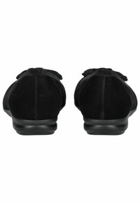 Zapatos de ante negros con textura suave, puntera redondeada y suela de goma baja. Presentan un detalle de lazo en la parte delantera y costuras mínimas.