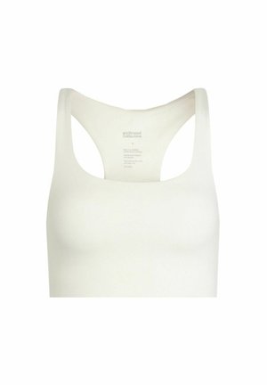 Valkoinen urheiluliivi, jossa on leveä pyöreä pääntie, avonainen selkäosa ja sileä, venyvä kangas. Sisältää sisäisen hoitoetiketin takana.