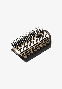 Hårborste med rundad form, svart plastbas och en texturerad yta i guld. Har långa, flexibla borst som hjälper till att reda ut håret.