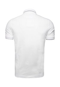 Vit kortärmad polo tröja i bomull, med en platt krage och en subtil grå accent på kragen. Slät textur och figursydd design.