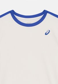 ASICS BOYS TENNIS SS - T-shirt desportiva - cream/dark blue