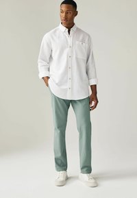 Next SLIM FIT STRETCH - Chinos tipa bikses - pale green