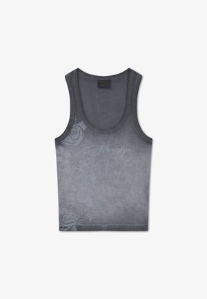 Débardeur sans manches gris foncé avec motifs floraux subtils et design de texte estompé à l'avant.