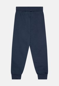 Donkerblauwe sweatpants van een katoenmix, met een elastische tailleband en taps toelopende manchetten, met een gladde textuur en een eenvoudig ontwerp.