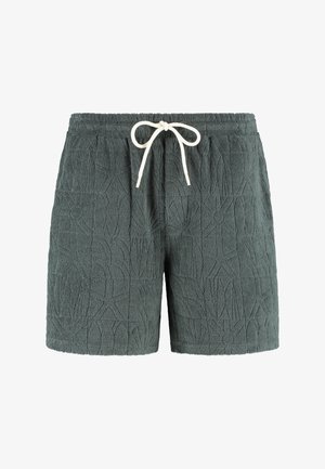 Kurze Hosen aus strukturiertem, dunkelgrünem Stoff mit einem geprägten Blattmuster. Mit einem elastischen Bund und einer weißen Kordel ausgestattet.