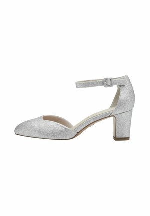 Scarpa con tacco alto in argento glitterato, con cinturino alla caviglia, punta a punta e tacco moderatamente grosso. Fodera interna liscia e accenti minimi.