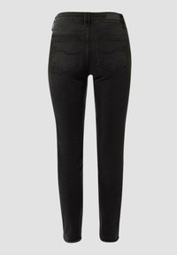 Schwarze, slim-fit Jeans mit glatter Textur, die zwei Gesäßtaschen und einen Standardbund haben, von hinten betrachtet.