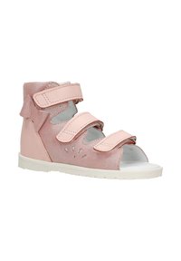 Helle rosa Kleinkind-Sandalen mit Klettverschlüssen, glitzerndem Obermaterial, ausgeschnittenen Details, weißer Sohle und Schleifenakzent an der Ferse.