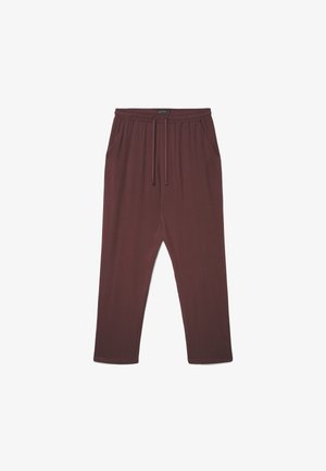 Pantalon marron à coupe ample avec taille élastique, cordon de serrage et poches latérales, présenté sur un fond blanc.