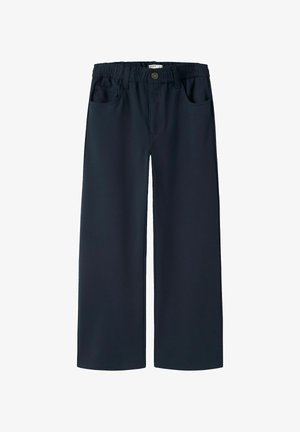 Tmavomodré nohavice so širokými nohavicami s elastickým pásom, zapínaním na gombík a prednými vreckami, navrhnuté na bežné nosenie.