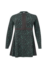 Tunique noire à manches longues avec un motif abstrait à taches turquoise et des détails en panneaux verticaux et horizontaux noirs unis.