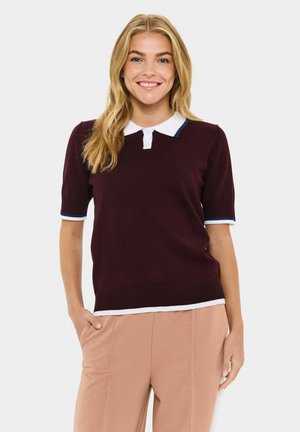 Burgundy short-sleeve polo shirt with a white collar and navy accents. Knitted fabric, ribbed cuffs and hem provide a structured fit.
