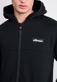 Ellesse MILLEROS - Mikina so zipsom - black
