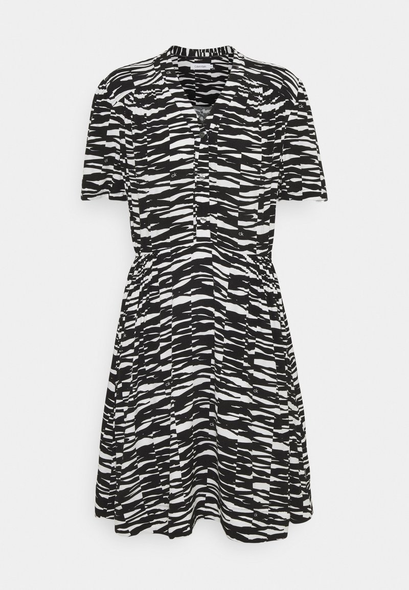 Black and white short-sleeve dress featuring a striped pattern, button front, waist elastic, and a flared skirt design.
