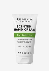 Parfymerad handkräm i tub, vit med gröna accenter. Innehåller doft av Earl Grey-te, 75 ml, inklusive sheasmör, tydliga textetiketter.
