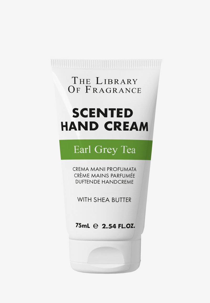 Parfymerad handkräm i tub, vit med gröna accenter. Innehåller doft av Earl Grey-te, 75 ml, inklusive sheasmör, tydliga textetiketter.