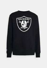 Felpa nera in misto cotone, con un grande logo bianco dei Raiders e un emblematico pirata sulla parte anteriore. Polsini e orlo a coste.