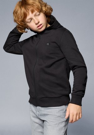 Calvin Klein Jeans MINI BADGE ZIP THROUGH UNISEX - Lukuga pusa - black