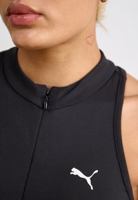 Puma DARE TO ONESIE - Kombinezon - black