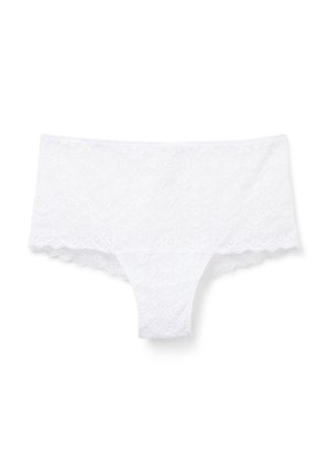 Sous-vêtement féminin style boyshort en dentelle blanche avec motif floral et bords festonnés sur fond uni.