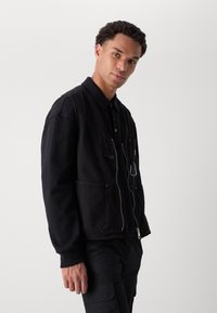 HUGO LUNUS - Γιλέκο - black