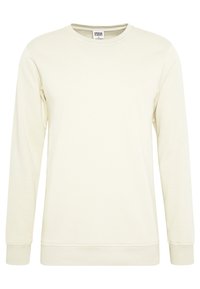 Kremowa bluza wykonana z miękkiego materiału, z okrągłym dekoltem, długimi rękawami i ściągaczami przy mankietach. Minimalistyczny design, bez wzorów.