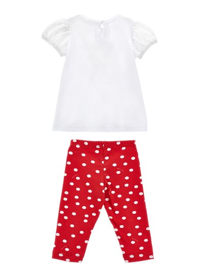 Top blanco con mangas cortas abullonadas y detalle en forma de llave en la parte posterior, combinado con leggings rojos con lunares blancos. Material de algodón suave.