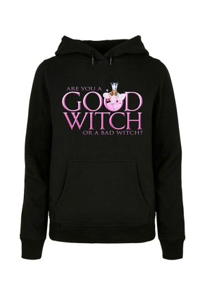 Black hoodie with a front pocket, featuring the text "Are you a good witch or a bad witch?" and an illustration of a fairy in pink.