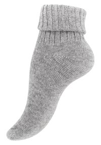 Gestrickter grauer Knöchelsocke mit geripptem Bündchen, weicher Textur und abgerundetem Zehenbereich. Das Material wirkt leicht und bequem für den Alltag.