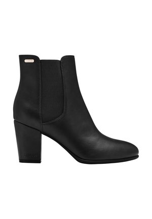Schwarzer Leder-Stiefelette mit Blockabsatz, elastischem Seitenteil und kleinem metallischen Markenlogo nahe dem oberen Rand.