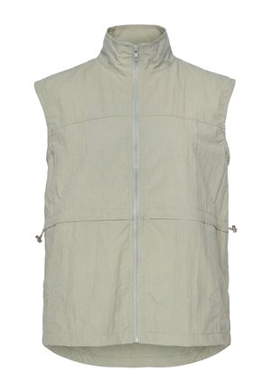 Gilet beige chiaro senza maniche con collo alto e zip frontale, dotato di coulisse regolabili in vita su entrambi i lati.