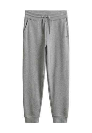 Pantalones deportivos grises de mezcla de algodón con cinturilla elástica, cordón, bolsillos laterales, puños acanalados y pequeño logo en el muslo izquierdo.