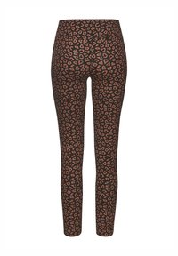 Schwarze Leggings mit einem Leopardenmuster in Brauntönen. Das Material ist dehnbar, hat eine glatte Textur und ein Design mit hohem Taillenbund.